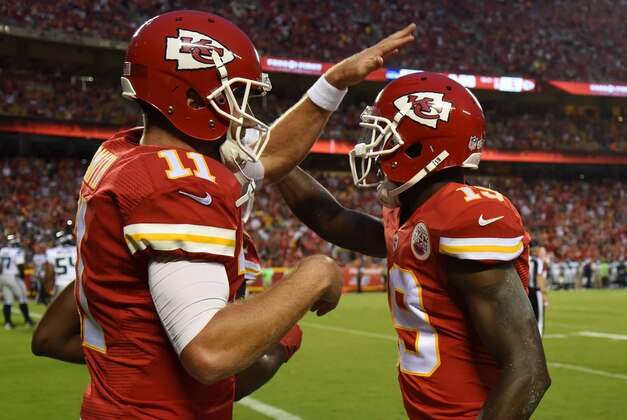Aug 21, 2015; Kansas City, MO, USA; Kansas City Chiefs wide receiver Jeremy Maclin (19) celebrates with quarterback Alex Smith (11) after catching a touchdown pass against the Seattle Seahawks in the first half at Arrowhead Stadium. Mandatory Credit: John Rieger-USA TODAY Sports