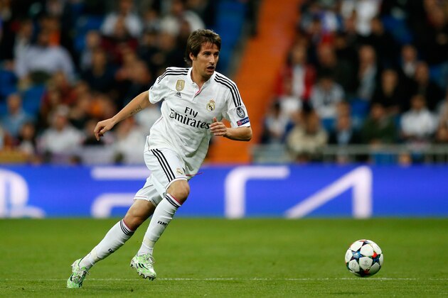 MADRID, SPAIN - MARCH 10:  Fabio Coentrao of Real Madrid runs with the ball during the UEFA Champions League Round of 16 second leg match between Real Madrid CF and FC Schalke 04 at Estadio Santiago Bernabeu on March 10, 2015 in Madrid, Spain.  (Photo by Boris Streubel/Getty Images)