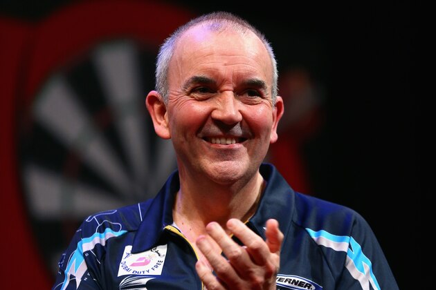 DUBAI, UNITED ARAB EMIRATES - MAY 29: Phil Taylor of England celebrates after winning against Gary Anderson of Scotland during the 2015 Dubai Duty Free Darts Masters Semi-Final match at Dubai Duty Free Tennis Stadium on May 29, 2015 in Dubai, United Arab Emirates.  (Photo by Francois Nel/Getty Images)