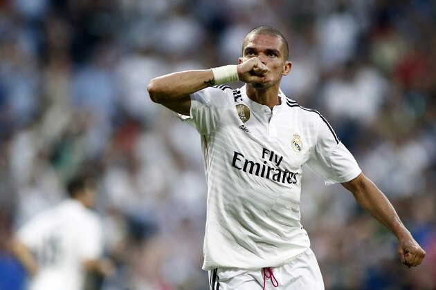 Real Madrid's Pepe from Portugal celebrates scoring a goal against Valencia during a Spanish La Liga soccer match at the Santiago Bernabeu stadium in Madrid, Spain, Saturday May 9, 2015. (AP Photo/Oscar del Pozo)