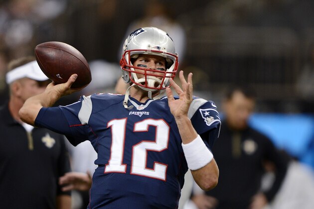 New England Patriots quarterback Tom Brady (12) warms up before an NFL football game against the New Orleans Saints in New Orleans, Saturday, Aug. 22, 2015. (AP Photo/Bill Feig)
