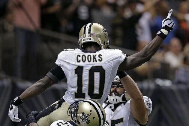 New England Patriots quarterback Jimmy Garoppolo (10) celebrates his touchdown in the first half of a preseason NFL football game against the New England Patriots in New Orleans, Saturday, Aug. 22, 2015. (AP Photo/Brynn Anderson)