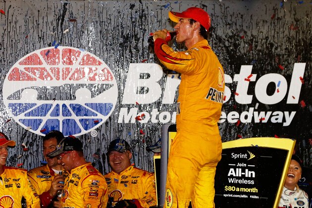 BRISTOL, TN - AUGUST 22:  Joey Logano, driver of the #22 Shell Pennzoil Ford, celebrates in Victory Lane after winning the NASCAR Sprint Cup Series IRWIN Tools Night Race at Bristol Motor Speedway on August 22, 2015 in Bristol, Tennessee.  (Photo by Jeff Zelevansky/Getty Images)