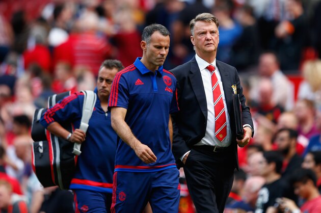 MANCHESTER, ENGLAND - AUGUST 22:  Louis van Gaal Manager of Manchester United and coach Ryan Giggs leave the pitch after their team's 0-0 draw in the Barclays Premier League match between Manchester United and Newcastle United at Old Trafford on August 22, 2015 in Manchester, England.  (Photo by Julian Finney/Getty Images)