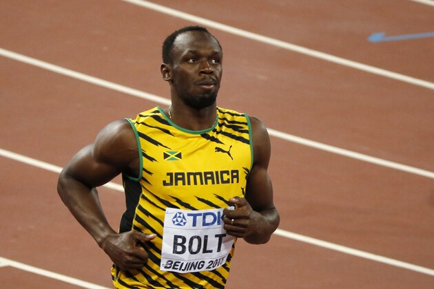 Jamaica's Usain Bolt reacts after a men's 100m semifinal at the World Athletics Championships at the Bird's Nest stadium in Beijing, Sunday, Aug. 23, 2015. (AP Photo/Mark Schiefelbein)