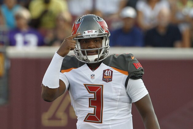 Tampa Bay Buccaneers quarterback Jameis Winston (3) signals at the line of scrimmage against the Minnesota Vikings during the first half of a preseason NFL football game at TCF Bank Stadium Saturday, Aug. 15, 2015, in Minneapolis. (AP Photo/Ann Heisenfelt)