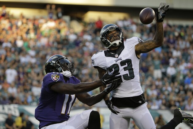 Philadelphia Eagles' Nolan Carroll II, right, blocks a pass intended for Baltimore Ravens' Kamar Aiken during the first half of a preseason NFL football game, Saturday, Aug. 22, 2015, in Philadelphia. (AP Photo/Michael Perez)