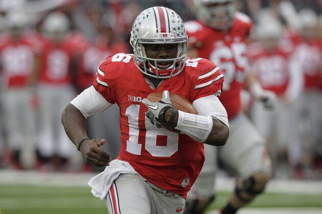 Ohio State quarterback J.T. Barrett plays against Michigan during an NCAA college football game Saturday, Nov. 29, 2014, in Columbus, Ohio. (AP Photo/Jay LaPrete)