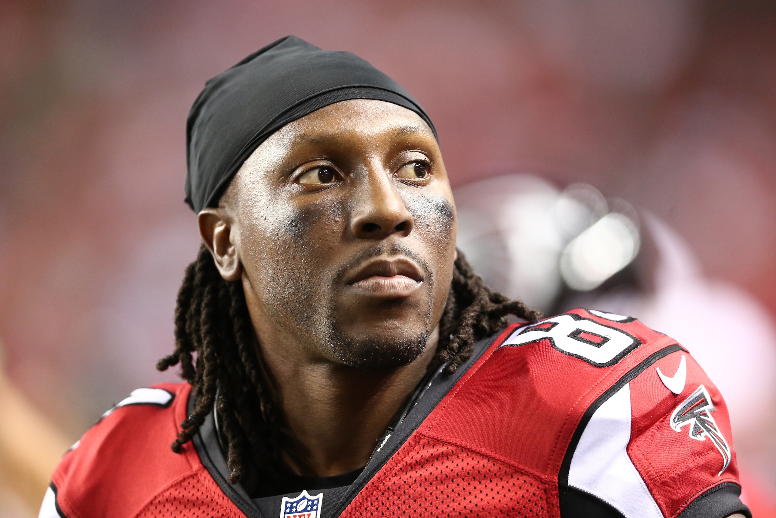Atlanta Falcons wide receiver Roddy White (84) watches from the sidelines during the second half of an NFL football preseason game , Friday, Aug. 14, 2015, in Atlanta. (AP Photo/John Bazemore)