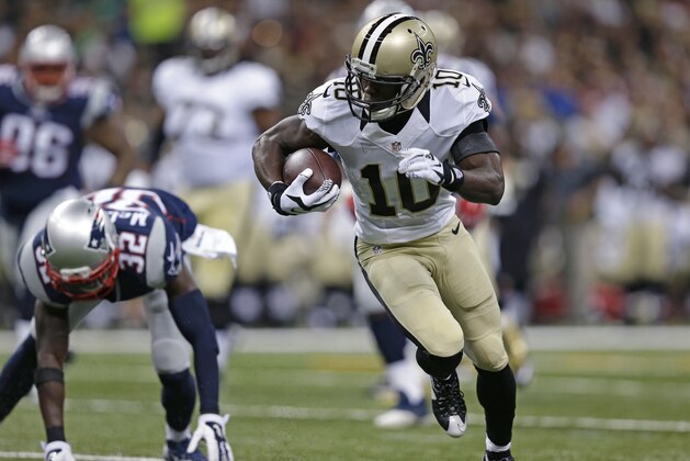 New Orleans Saints wide receiver Brandin Cooks (10) carries in the first half of a preseason NFL football game against the New England Patriots in New Orleans, Saturday, Aug. 22, 2015. (AP Photo/Brynn Anderson)