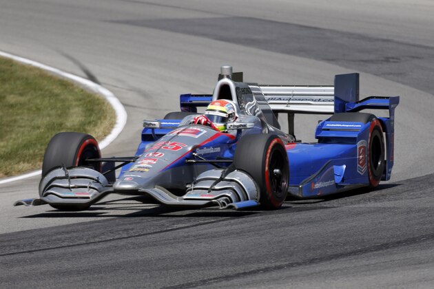 Justin Wilson, of England, on track during the IndyCar Honda Indy 200 auto racing Sunday, Aug. 2, 2015, at Mid-Ohio Sports Car Course in Lexington, Ohio. (AP Photo/Tom E. Puskar)