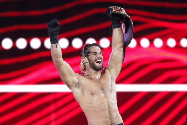 WWE Superstar Seth Rollins celebrates becoming the new WWE World Heavyweight Champion at WrestleMania 31 at Levi's Stadium on Sunday, March 29, 2015 in Santa Clara, CA. WrestleMania broke the Levi’s Stadium attendance record at 76,976 fans from all 50 states and 40 countries. (Don Feria/AP Images for WWE)
