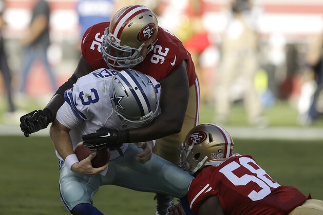 Dallas Cowboys quarterback Brandon Weeden (3) is sacked by San Francisco 49ers outside linebacker Eli Harold (58) and defensive end Quinton Dial (92) during the first half of an NFL preseason football game in Santa Clara, Calif., Sunday, Aug. 23, 2015. (AP Photo/Ben Margot)