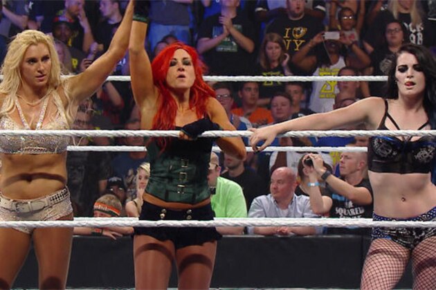 WWE wrestlers Brie Bella, left, and Nikki Bella attend the world premiere of