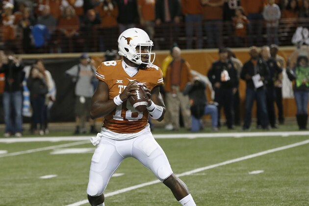 AUSTIN, TX - NOVEMBER 27: Tyrone Swoopes #18 of the Texas Longhorns drops back to pass against the TCU Horned Frogs at Darrell K Royal -Texas Memorial Stadium on November 27, 2014 in Austin, Texas. (Photo by Chris Covatta/Getty Images)
