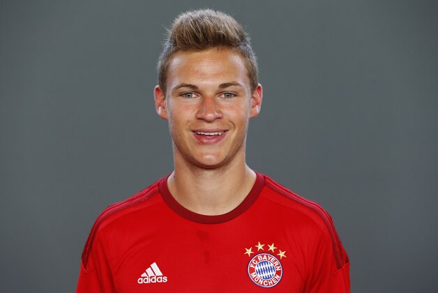Bayern’s Joshua Kimmich poses during an official photo shooting for the upcoming German first division Bundesliga soccer season in Munich, Germany, on Thursday, July 16, 2015. (AP Photo/Matthias Schrader)