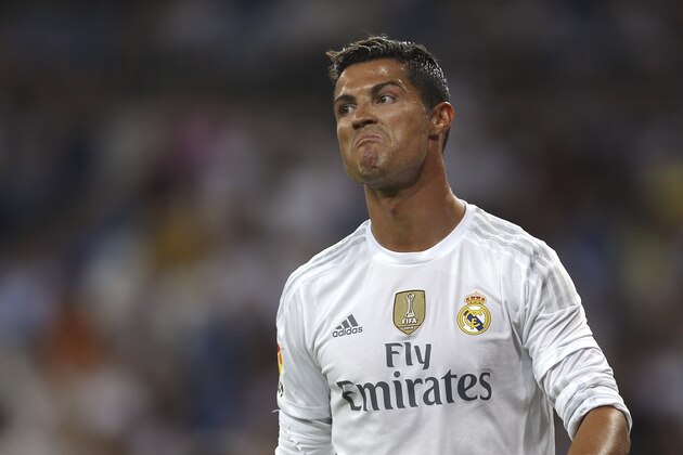 Real Madrid's Cristiano Ronaldo grimaces during the Santiago Bernabeu trophy soccer match between Real Madrid and Galatasaray at the Santiago Bernabeu Stadium in Madrid, Spain, Tuesday, Aug. 18, 2015. Real Madrid won 2-1. (AP Photo/Francisco Seco)