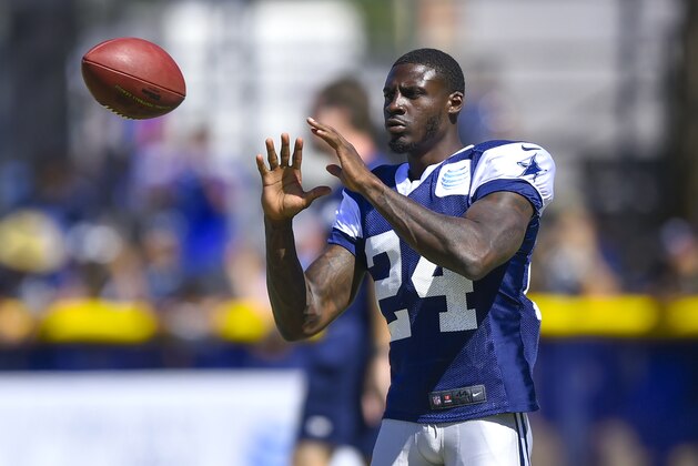 Dallas Cowboys cornerback Morris Claiborne warms up during Dallas Cowboys' NFL training camp, Tuesday, Aug. 4, 2015, in Oxnard, Calif. (AP Photo/Gus Ruelas)