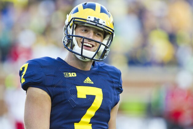 Michigan quarterback Shane Morris (7) reacts after a touchdown pass he threw was dropped in the end zone in the fourth quarter of an NCAA college football game against Miami (Ohio) in Ann Arbor, Mich., Saturday, Sept. 13, 2014. (AP Photo/Tony Ding)