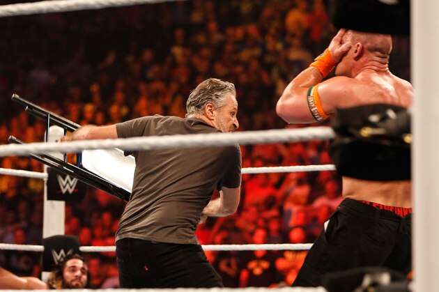 NEW YORK, NY - AUGUST 23:  Jon Stewart gets into the action at WWE SummerSlam 2015 Barclays Center of Brooklyn on August 23, 2015 in New York City.  (Photo by JP Yim/Getty Images)