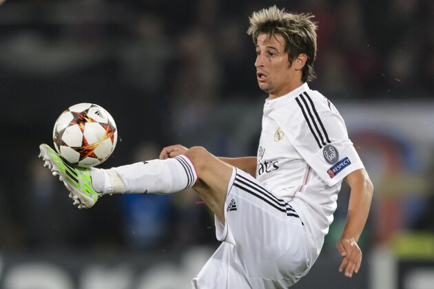 Real Madrid's Portuguese defender Fabio Coentrao controls the ball during the UEFA Champions League Group B football match between FC Basel and Real Madrid in Basel on November 26, 2014. AFP PHOTO / FABRICE COFFRINI        (Photo credit should read FABRICE COFFRINI/AFP/Getty Images)