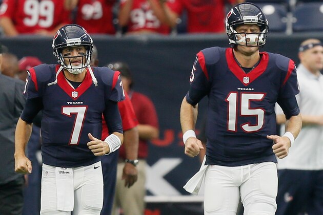 HOUSTON, TX - AUGUST 15:  Brian Hoyer #7 of the Houston Texans and Ryan Mallett #15 take the field during a preseason football game at NRG Stadium on August 15, 2015 in Houston, Texas. Houston won 23-10.  (Photo by Bob Levey/Getty Images)