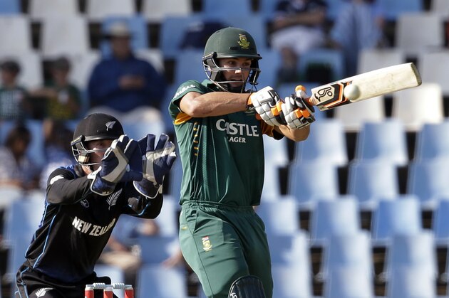 South Africa’s batsman Rilee Rossouw,  plays a shot as New Zealand’s wicketkeeper Luke Ronchi, left, watches during their first One Day International cricket match at the Centurion Park stadium in Pretoria, South Africa, Wednesday, Aug. 19, 2015. (AP Photo/Themba Hadebe)