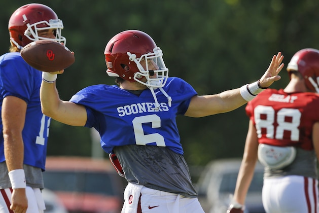 Oklahoma quarterback Baker Mayfield throws during an Oklahoma NCAA college football practice in Norman, Okla., Monday, Aug. 10, 2015. (AP Photo/Sue Ogrocki)
