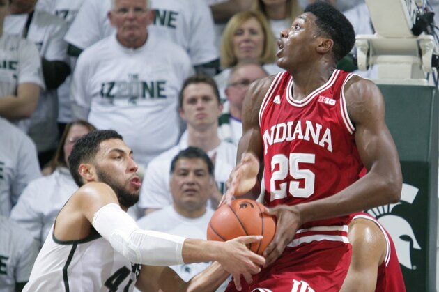 Michigan State's Denzel Valentine, left, steals the ball from Indiana's Emmitt Holt (25) during the first half of an NCAA college basketball game, Monday, Jan. 5, 2015, in East Lansing, Mich. (AP Photo/Al Goldis)