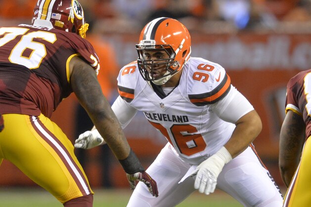 Cleveland Browns defensive tackle Xavier Cooper (96) rushes the line during an NFL preseason football game against the Washington Redskins Thursday, Aug. 13, 2015, in Cleveland. Washington won 20-17. (AP Photo/David Richard)