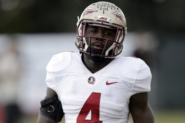 Florida State running back Dalvin Cook walks during a break during NCAA college football practice in Carson, Calif., Tuesday, Dec. 30, 2014. Florida State is scheduled to play Oregon in the Rose Bowl NCAA college football playoff semifinal on New Year's Day. (AP Photo/Kelvin Kuo)