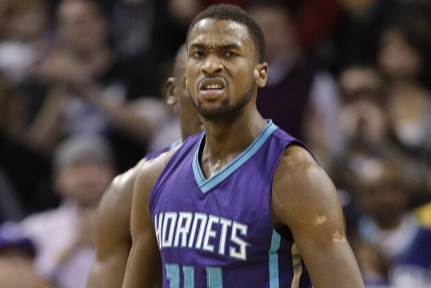 Charlotte Hornets' Michael Kidd-Gilchrist reacts after blocking a shot against the Indiana Pacers during the second half of an NBA basketball game in Charlotte, N.C., Saturday, Jan. 17, 2015. The Hornets won 80-71 in overtime. (AP Photo/Chuck Burton)