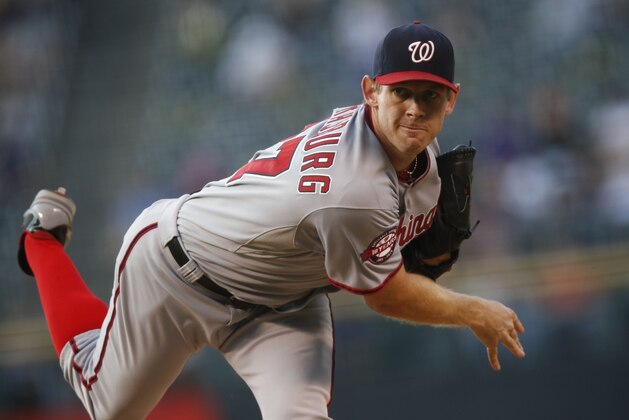Washington Nationals starting pitcher Stephen Strasburg (37) in the first inning of a baseball game Wednesday, Aug. 19, 2015, in Denver. (AP Photo/David Zalubowski)
