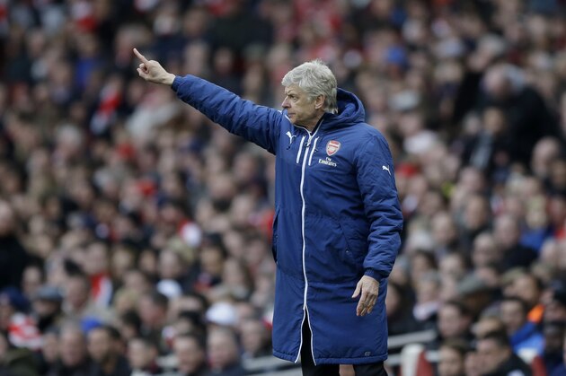 Arsenal's French manager Arsene Wenger gestures from the sidelines during the English Premier League soccer match between Arsenal and West Ham United at the Emirates Stadium in London, Saturday, March 14, 2015.  (AP Photo/Matt Dunham)