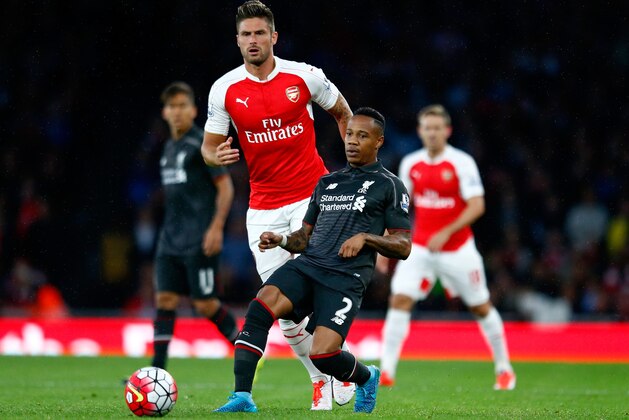 LONDON, ENGLAND - AUGUST 24:  Nathaniel Clyne of Liverpool is closed down by Olivier Giroud of Arsenal during the Barclays Premier League match between Arsenal and Liverpool at the Emirates Stadium on August 24, 2015 in London, United Kingdom.  (Photo by Julian Finney/Getty Images)