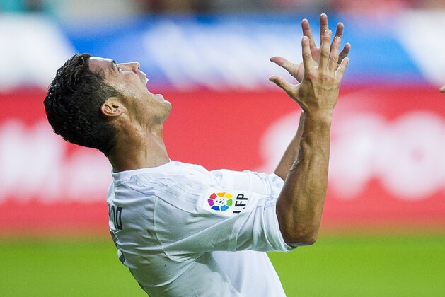 GIJON, SPAIN - AUGUST 23: Cristiano Ronaldo of Real Madrid reacts during the La Liga match between Sporting Gijon and Real Madrid at Estadio El Molinon on August 23, 2015 in Gijon, Spain. (Photo by Juan Manuel Serrano Arce/Getty Images)