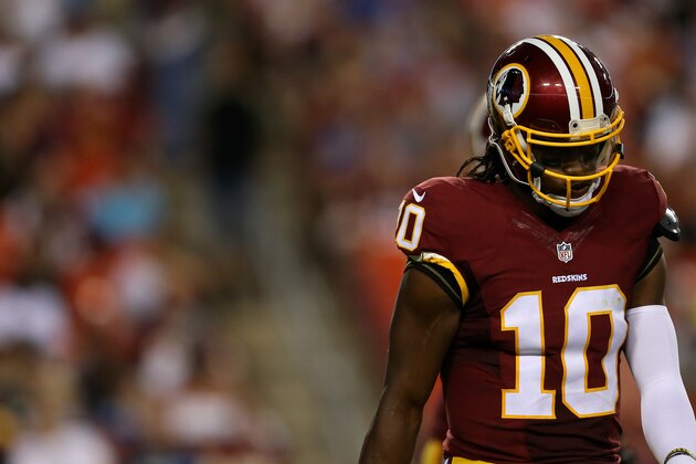 LANDOVER, MD - AUGUST 20: Quarterback Robert Griffin III #10 of the Washington Redskins walks off the field during a preseason game against the Detroit Lions at FedEx Field on August 20, 2015 in Landover, Maryland.  (Photo by Matt Hazlett/Getty Images)