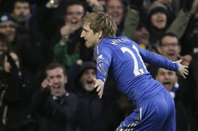 Chelsea's Marko Marin celebrates after scoring a goal against Wigan Athletic during their English Premier League soccer match at Chelsea's Stamford Bridge stadium in London, Saturday, Feb.  9, 2013. (AP Photo/Alastair Grant)