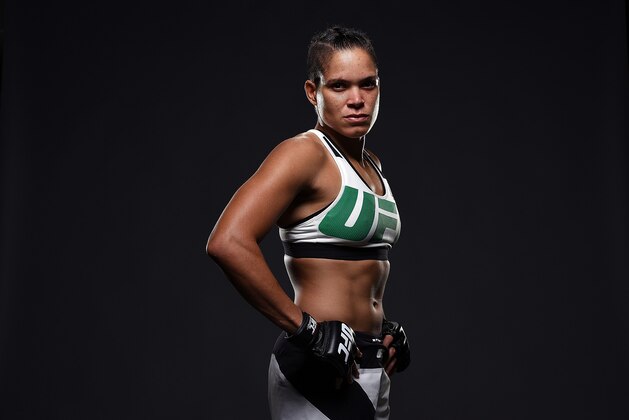 NASHVILLE, TN - AUGUST 08:  Amanda Nunes of Brazil poses for a post fight portrait backstage during the UFC Fight Night event at Bridgestone Arena on August 8, 2015 in Nashville, Tennessee.  (Photo by Mike Roach/Zuffa LLC/Zuffa LLC via Getty Images)