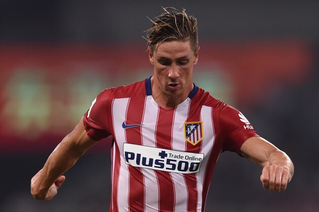 Atletico Madrid's Spanish forward Fernando Torres controls the ball during a friendly football match between Shanghai SIPG and Atletico Madrid in Shanghai on August 4, 2015. AFP PHOTO / JOHANNES EISELE        (Photo credit should read JOHANNES EISELE/AFP/Getty Images)