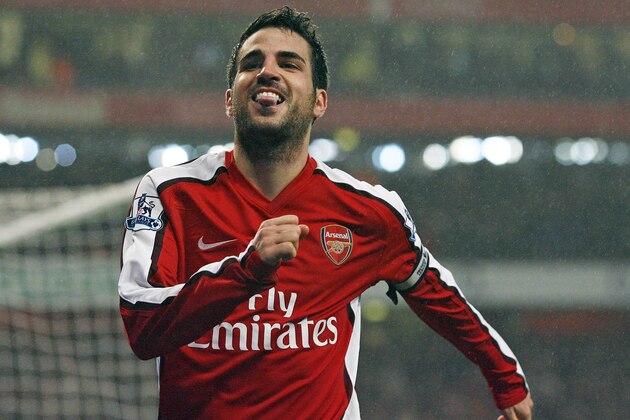 Arsenal's Spanish midfielder Cesc Fabregas celebrates scoring the second goal from the penalty spot during the English Premier League football match between Arsenal and West Ham United at the Emirates stadium, north London on March 20, 2010. AFP PHOTO/GLYN KIRK  FOR EDITORIAL USE ONLY Additional licence required for any commercial/promotional use or use on TV or internet (except identical online version of newspaper) of Premier League/Football League photos. Tel DataCo +44 207 2981656. Do not alter/modify photo. (Photo credit should read GLYN KIRK/AFP/Getty Images)