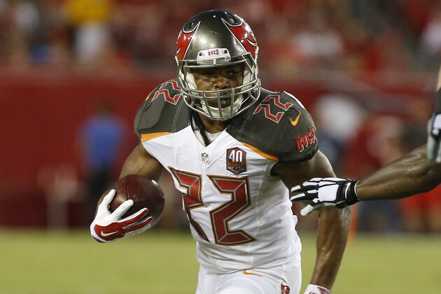 Tampa Bay Buccaneers running back Doug Martin (22) runs against the Cincinnati Bengals during the first quarter of an NFL preseason football game Monday, Aug. 24, 2015, in Tampa, Fla. (AP Photo/Brian Blanco)