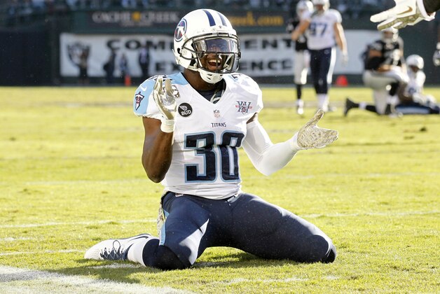 Nov 24, 2013; Oakland, CA, USA; Tennessee Titans cornerback Jason McCourty (30) reacts after breaking up a pass intended for Oakland Raiders wide receiver Brice Butler (not pictured) in the second quarter at O.co Coliseum. Mandatory Credit: Cary Edmondson-USA TODAY Sports