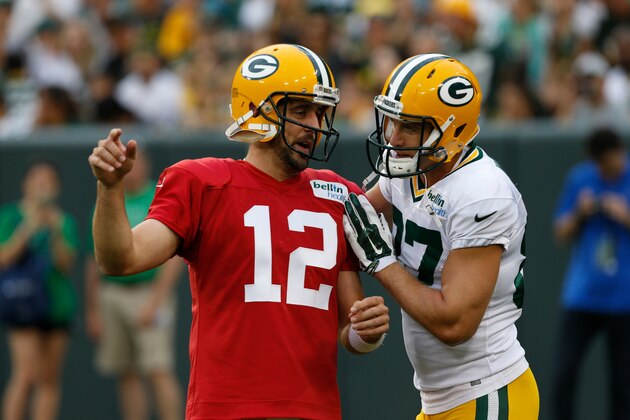 Green Bay Packers’ Aaron Rodgers (12) and Jordy Nelson during the Green Bay Packers Family Fun Night NFL football training camp practice Saturday, Aug. 8 , 2015, in Green Bay, Wis. (AP Photo/Mike Roemer)