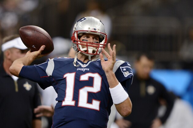 New England Patriots quarterback Tom Brady (12) warms up before an NFL football game against the New Orleans Saints in New Orleans, Saturday, Aug. 22, 2015. (AP Photo/Bill Feig)
