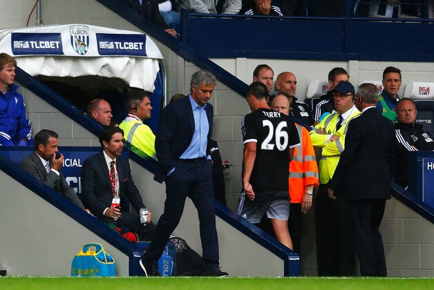 WEST BROMWICH, ENGLAND - AUGUST 23:  John Terry of Chelsea leaves the pitch after being sent off as Jose Mourinho, manager of Chelsea looks on during the Barclays Premier League match between West Bromwich Albion and Chelsea at The Hawthorns on August 23, 2015 in West Bromwich, England.  (Photo by Julian Finney/Getty Images)