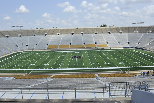Installation of field turf is completed at Notre Dame football stadium Tuesday July 30, 2014 in South Bend, Ind. Notre Dame is scheduled to open their season against Rice Saturday Aug. 30, 2014 (AP Photo/Joe Raymond)