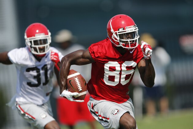 Georgia receiver Justin Scott-Wesley (86) runs after catch during a college football practice Tuesday, Aug. 4, 2015, in Athens, Ga. (AP Photo/John Bazemore)