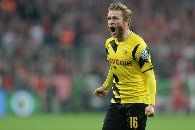 Dortmund's Polish midfielder Jakub Blaszczykowski celebrates the equalizer during the German Cup DFB Pokal semi-final football match FC Bayern Munich v Borussia Dortmund in Munich, southern Germany, on April 28, 2015.  AFP PHOTO / CHRISTOF STACHE

+++ RESTRICTIONS / EMBARGO  ACCORDING TO DFB RULES IMAGE SEQUENCES TO SIMULATE VIDEO IS NOT ALLOWED DURING MATCH TIME. MOBILE (MMS) USE IS NOT ALLOWED DURING AND FOR FURTHER TWO HOURS AFTER THE MATCH. FOR MORE INFORMATION CONTACT DFB DIRECTLY AT +49 69 67880        (Photo credit should read CHRISTOF STACHE/AFP/Getty Images)