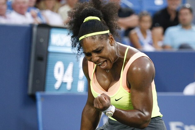 Serena Williams, of the United States, reacts during a semifinal match against Elina Svitolina, of Ukraine, at the Western & Southern Open tennis tournament, Saturday, Aug. 22, 2015, in Mason, Ohio. Williams defeated Svitolina 6-4, 6-3. (AP Photo/John Minchillo)